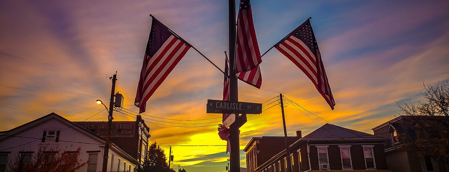 The Square with Flags at Sunrise